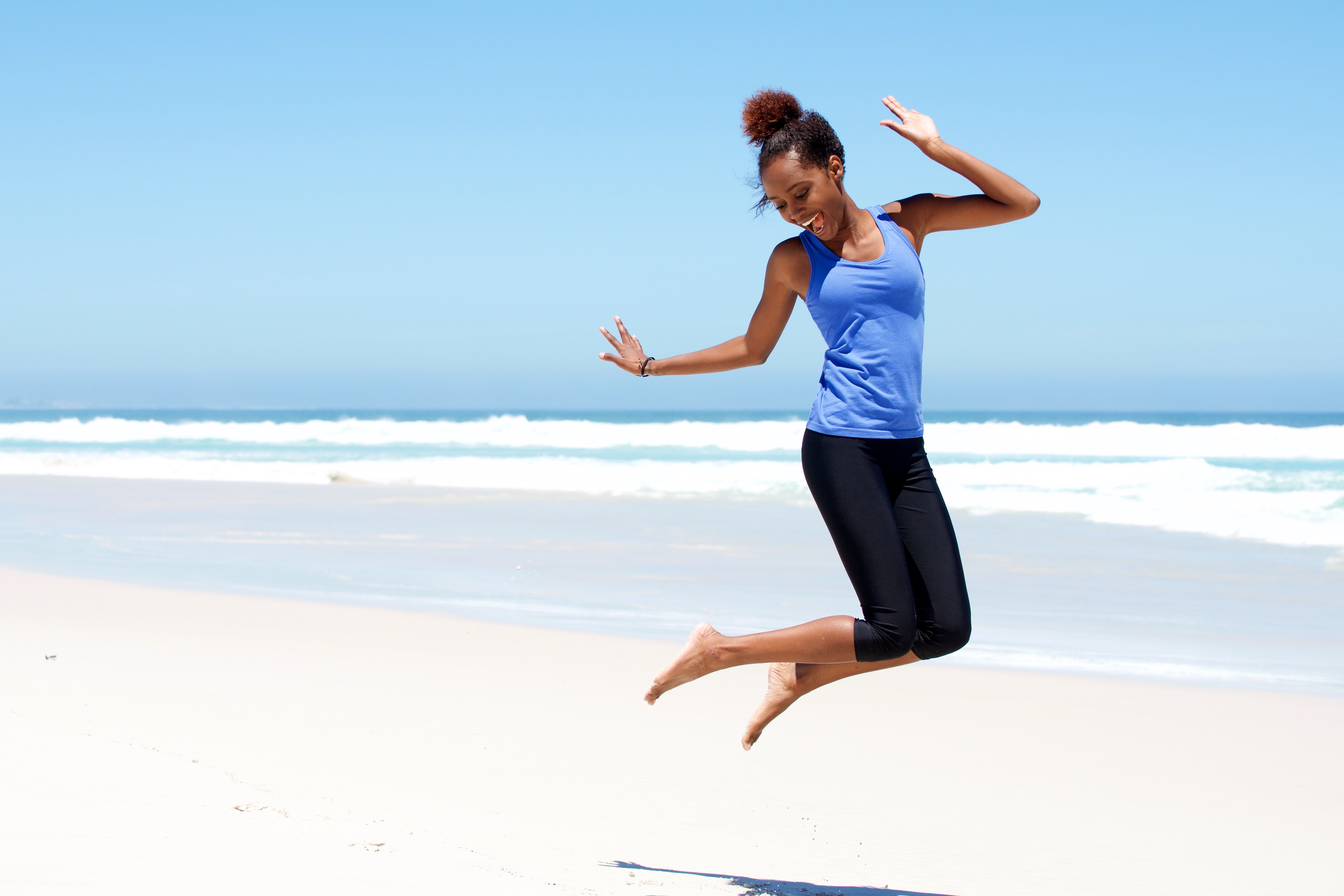 Happy woman jumping